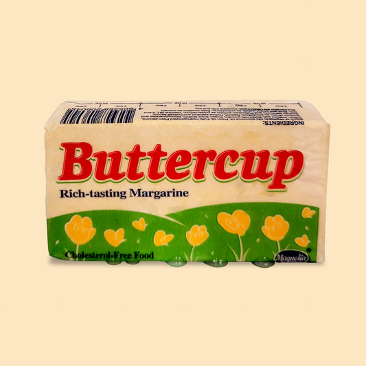 Magnolia Buttercup 200g margarine block with yellow flower design on green packaging, rich-tasting butter alternative